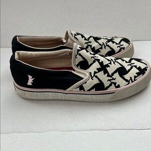Juicy Couture Black and Cream dog motif Slip-On Sneakers.
